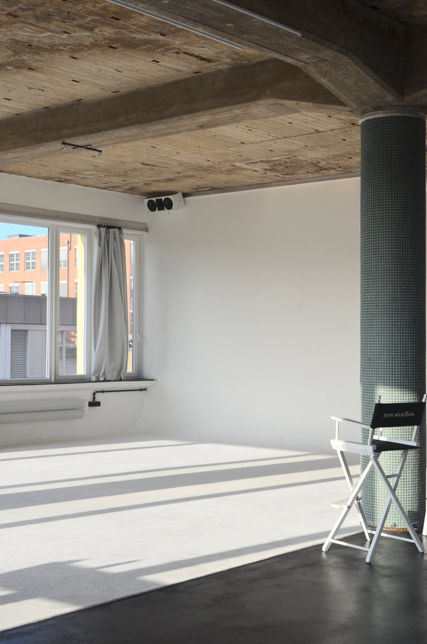 spacious light studio with chair