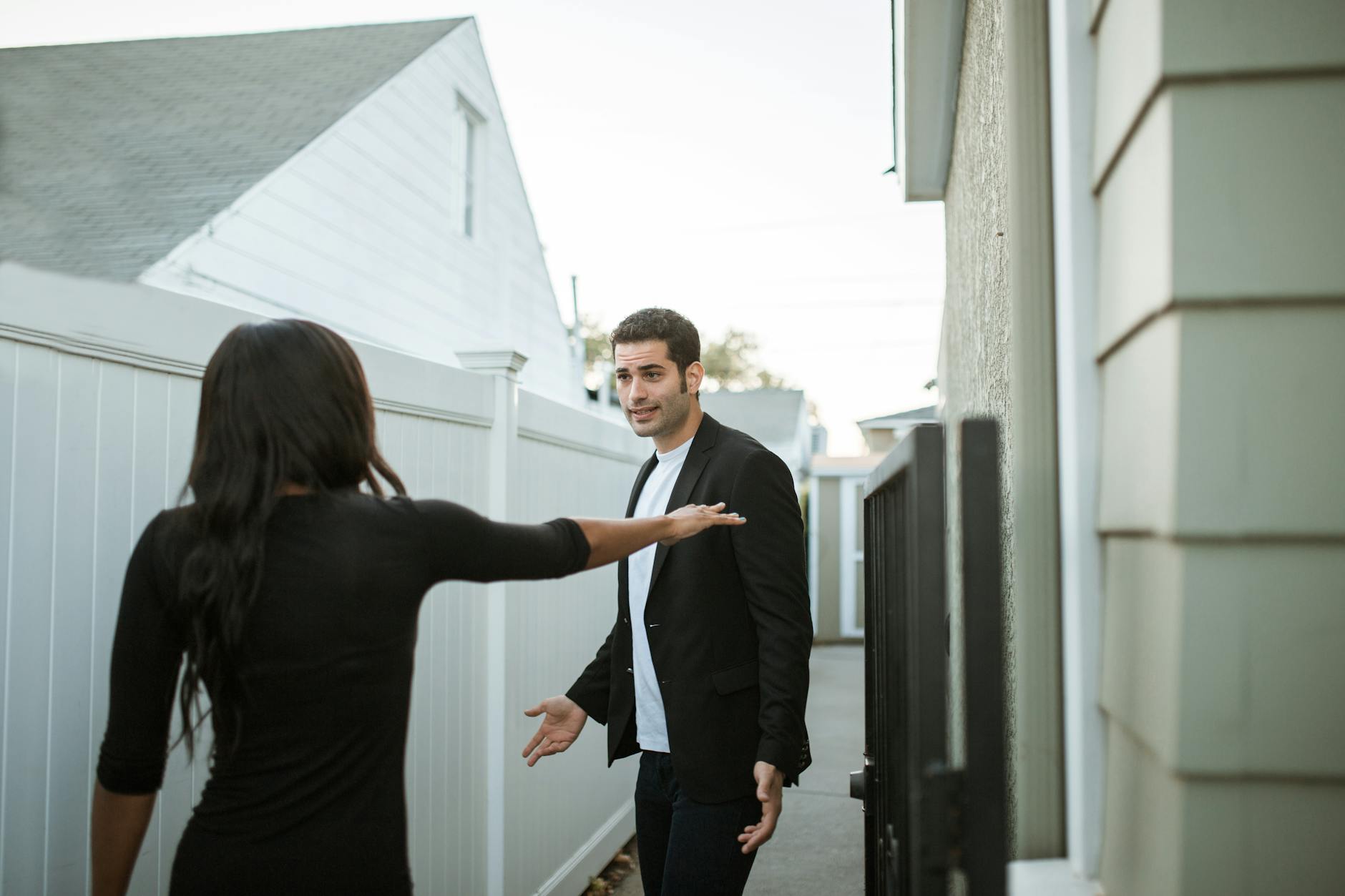 man in black long sleeve shirt and woman in black long sleeve shirt